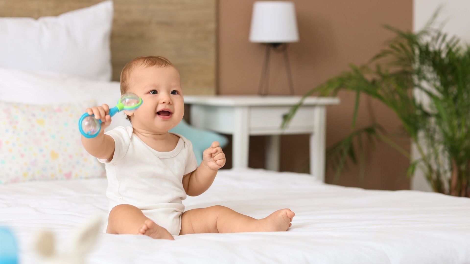 Hangot adó játékok: zörgős építőjáték babáknak